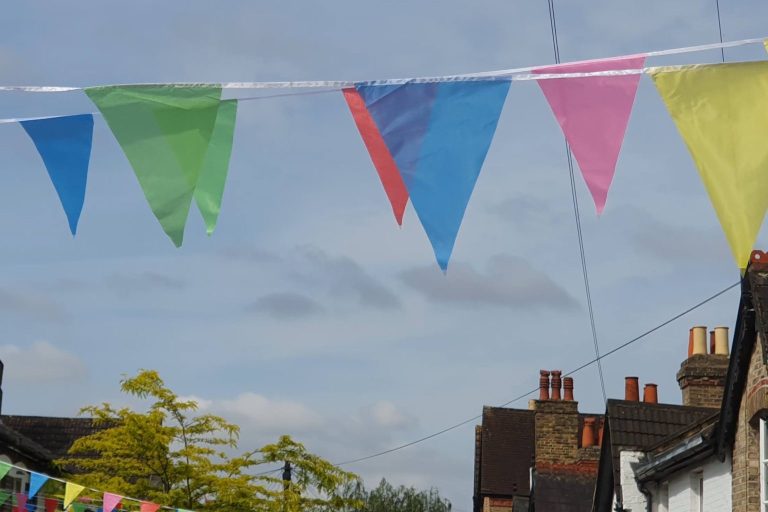 Bunting across the street