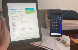 Person calculating bill payment