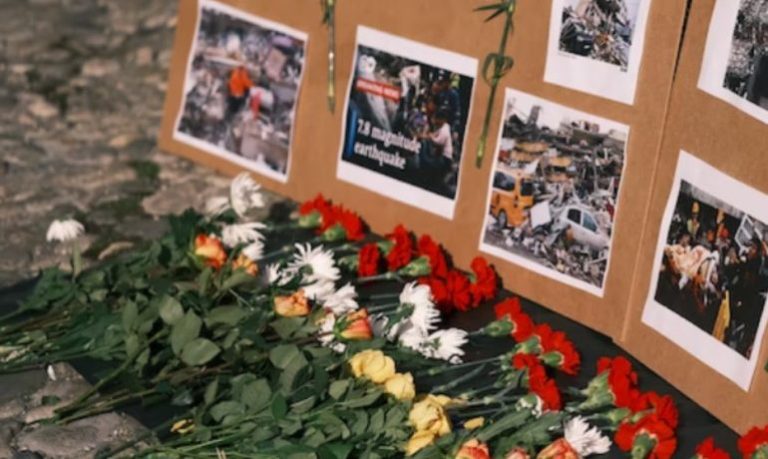 Flowers laid for people affected by the earthquake in Turkey in 2023